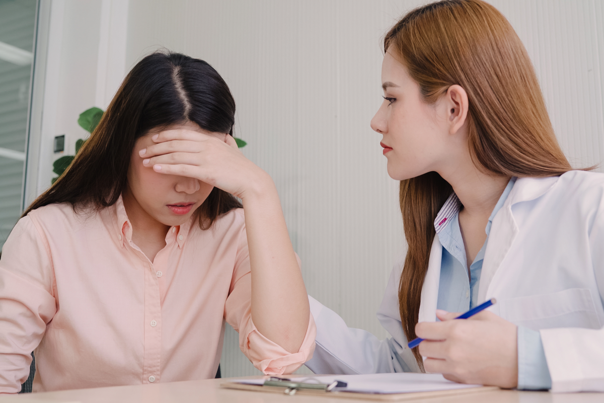 doctor talking to teen doctor talking to teen