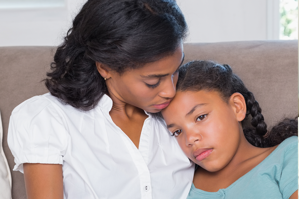 Mom hugging a girl