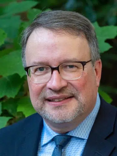 Headshot of Alain Moreau. PhD