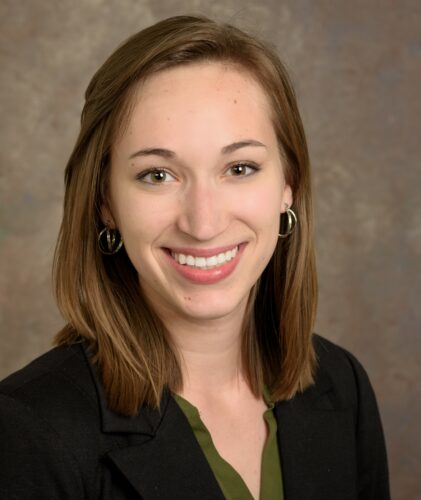 Professional headshot of Danielle Meadows smiling at the camera.