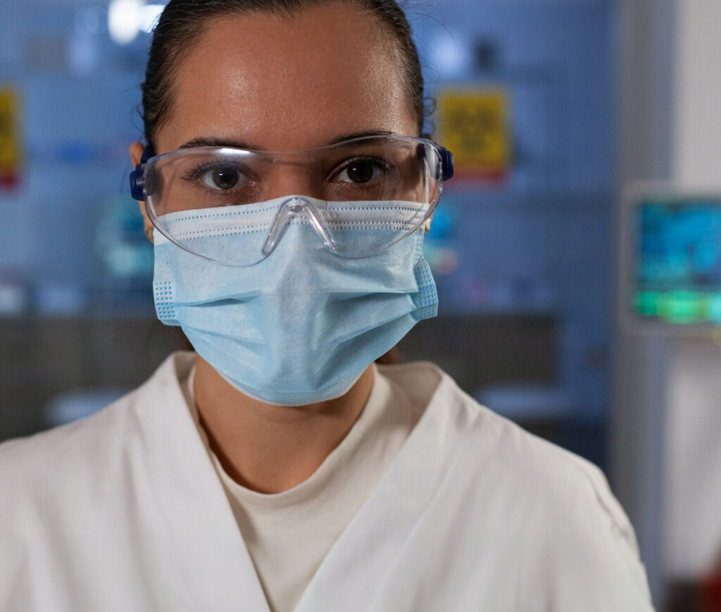 Portrait of scientist researcher wearing protective face mask against covid19