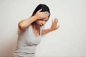 Woman suffering from dizziness and headache due to Orthostatic Intolerance