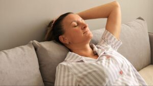 Exhausted woman suffering from ME CFS