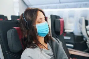 woman sleeping on a plane
