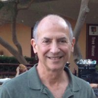 The image is a headshot of Dr. David L. Kaufman.